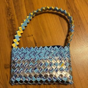 Chupa Handcrafted Blue and Yellow Woven Handbag